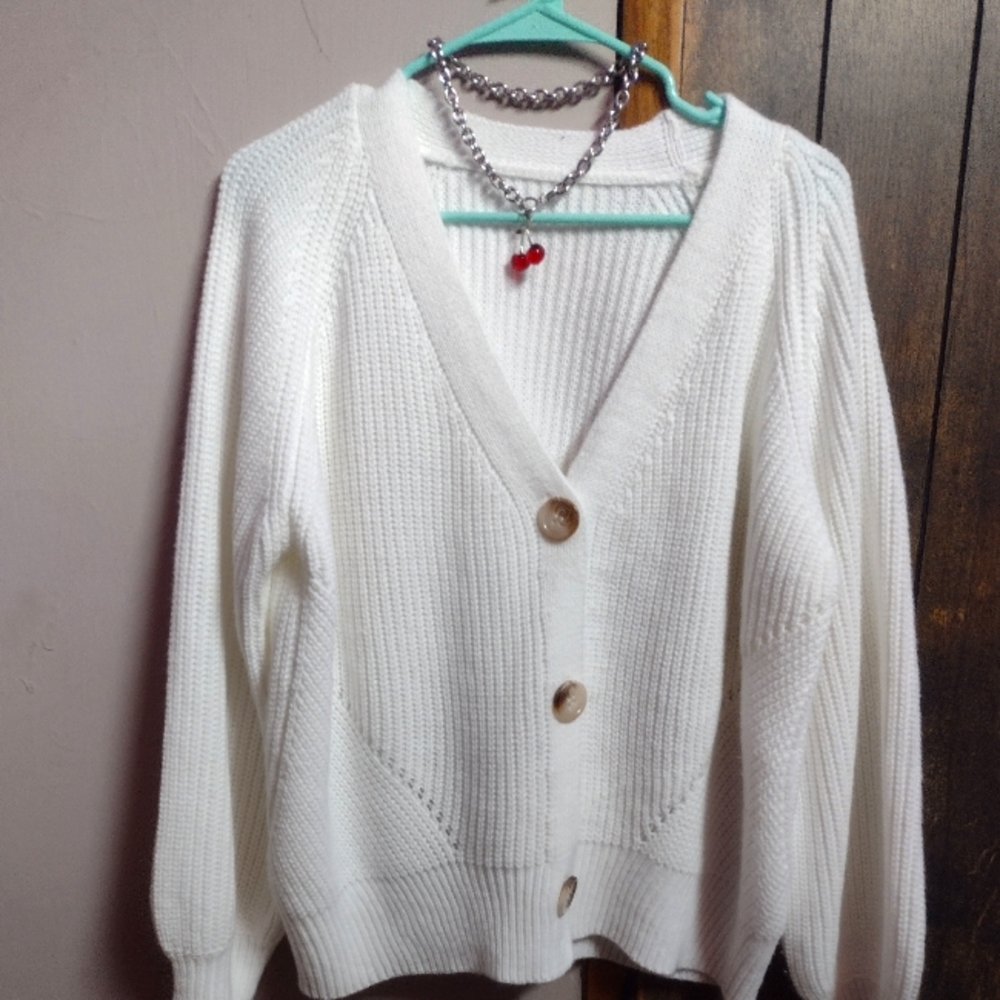 White cable knit sweater